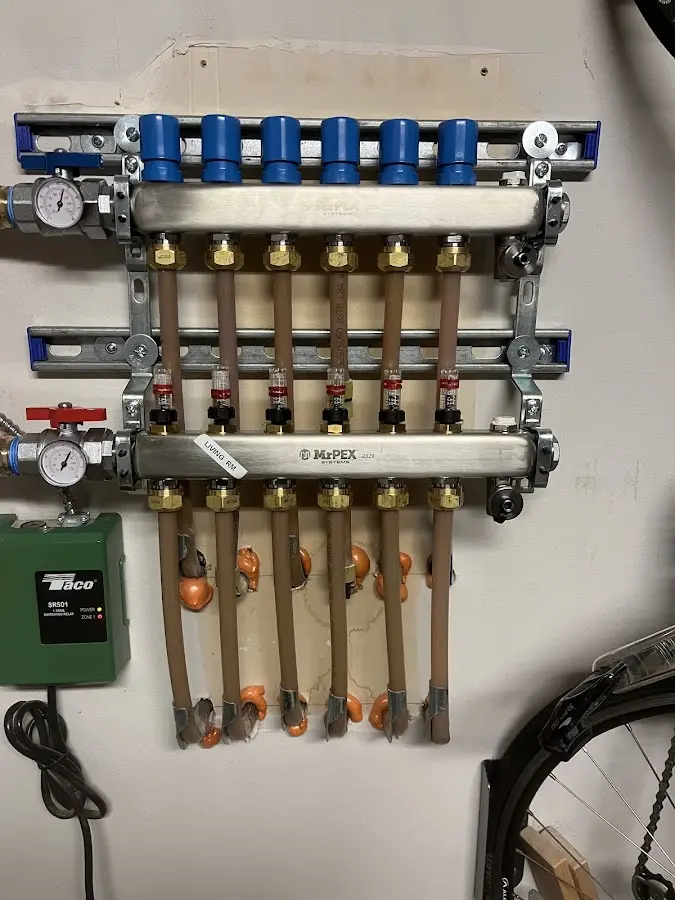 Plumber performing Leak Detection at a residential property in Winterset